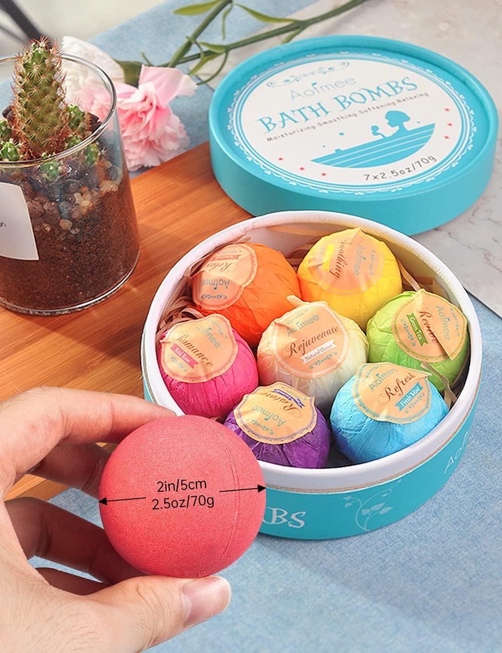 Aofmee gift display with bath bombs styled in a spa setting for presenting