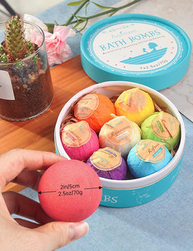 Aofmee gift display with bath bombs styled in a spa setting for presenting