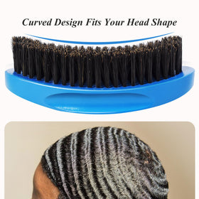Aosina brush gliding over hair to demonstrate smoothing and wave definition