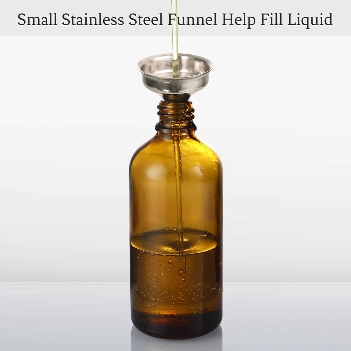AOZITA hand holding bottle to show 120ml scale and portable convenience