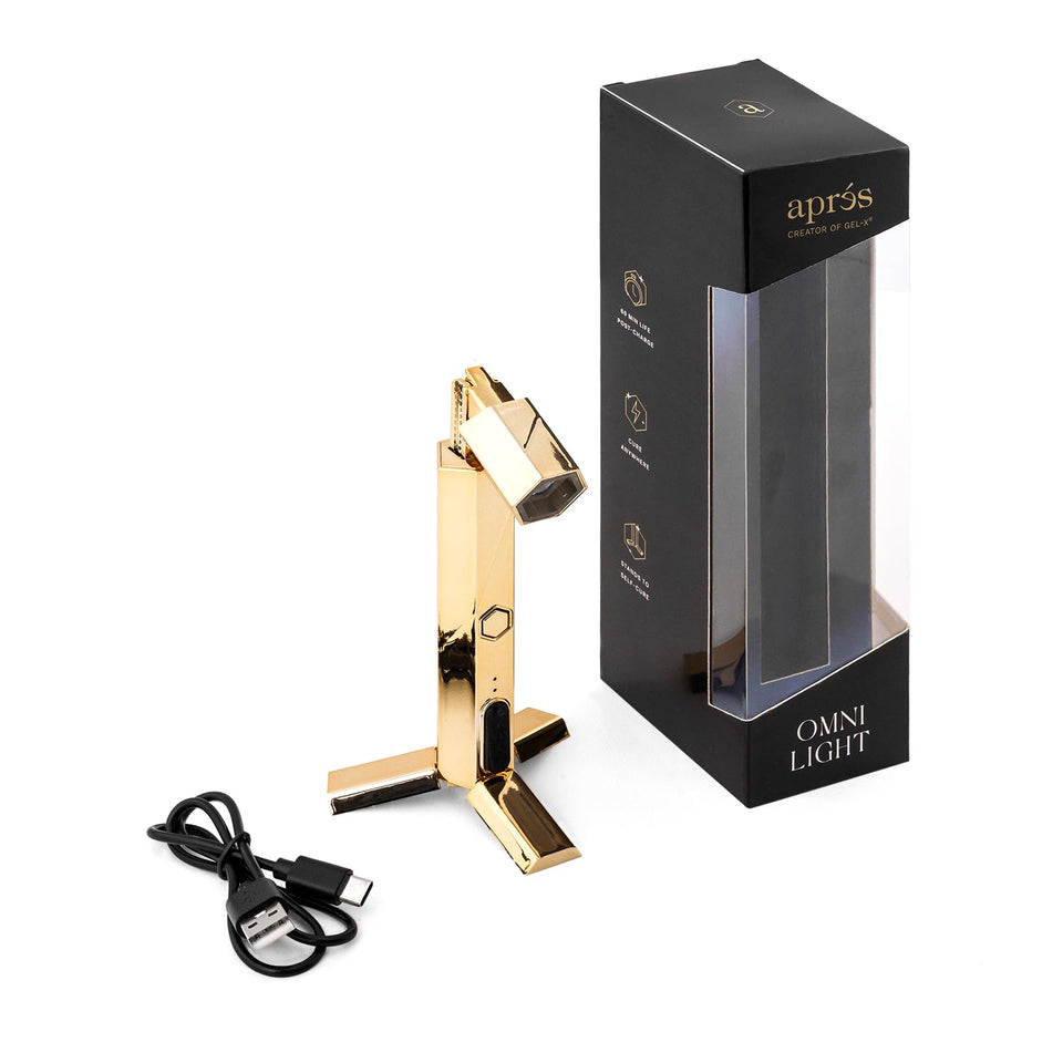 APRÉS Omni Light front view showing compact gold body and benefits for portable curing