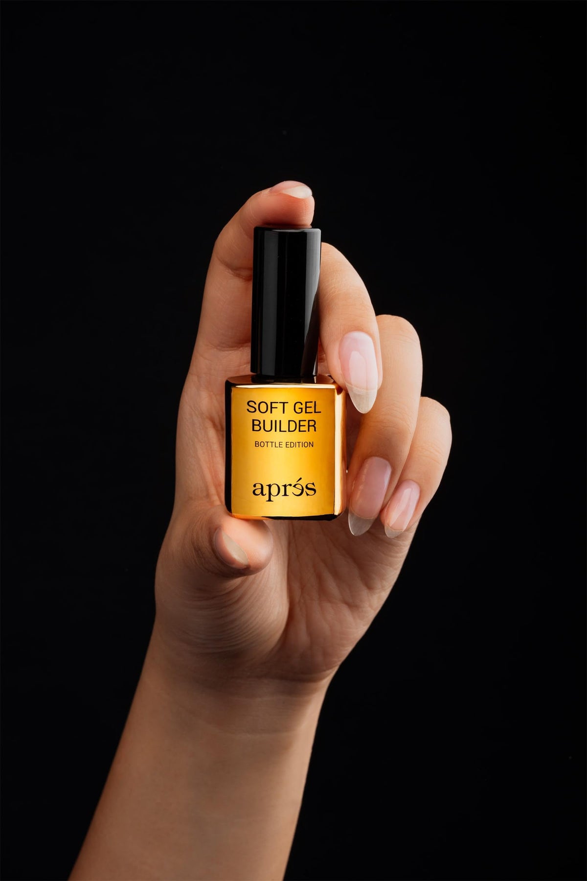 APRÉS overlay on natural nail showing enhanced strength and natural look