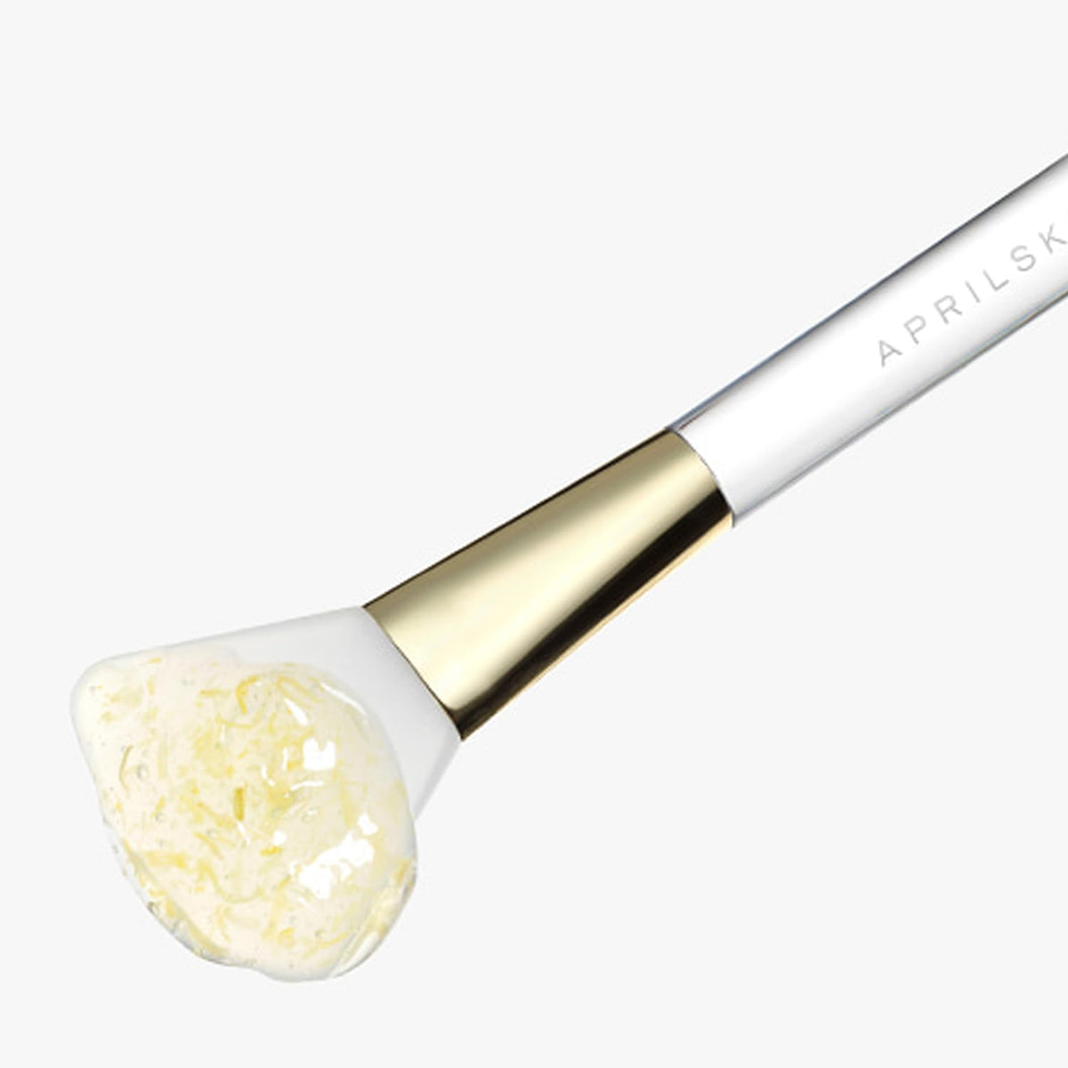 APRILSKIN Jelly Brush applying mask on model demonstrating even coverage and mess-free application