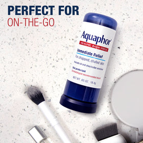 Aquaphor stick used on cracked heel to protect and soften skin