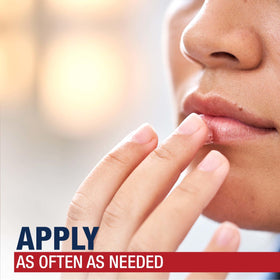 Aquaphor being applied to lips to soothe and seal in moisture