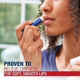 Close-up of Aquaphor lip balm texture demonstrating smooth, moisturizing finish