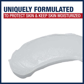 Small dab of Aquaphor on lips demonstrating soothing and chapping relief