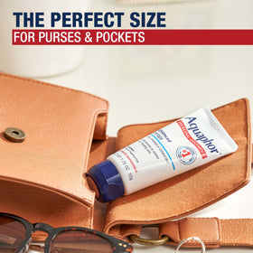 Aquaphor tube inside a travel kit bag showing on-the-go skin protection