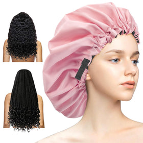 Aquior shower cap front view showing roomy fit and pink color for style protection