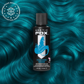 ARCTIC FOX swatch on light blonde hair showing vivid aquamarine payoff