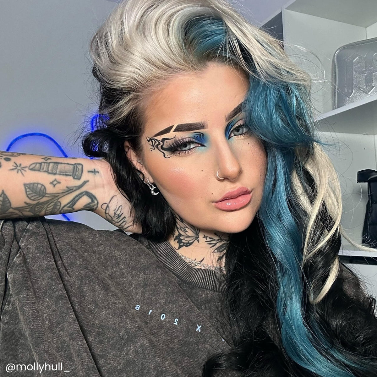 ARCTIC FOX applying Blue Jean Baby to pre-lightened hair for rich color