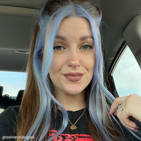 ARCTIC FOX Periwinkle on light blonde hair showing pastel tone vibrancy