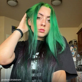 ARCTIC FOX model with medium-length hair dyed Phantom Green showing vibrant results