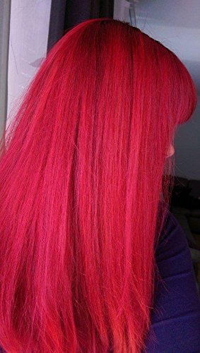 ARCTIC FOX styled hair lifestyle photo showcasing bold red color confidence