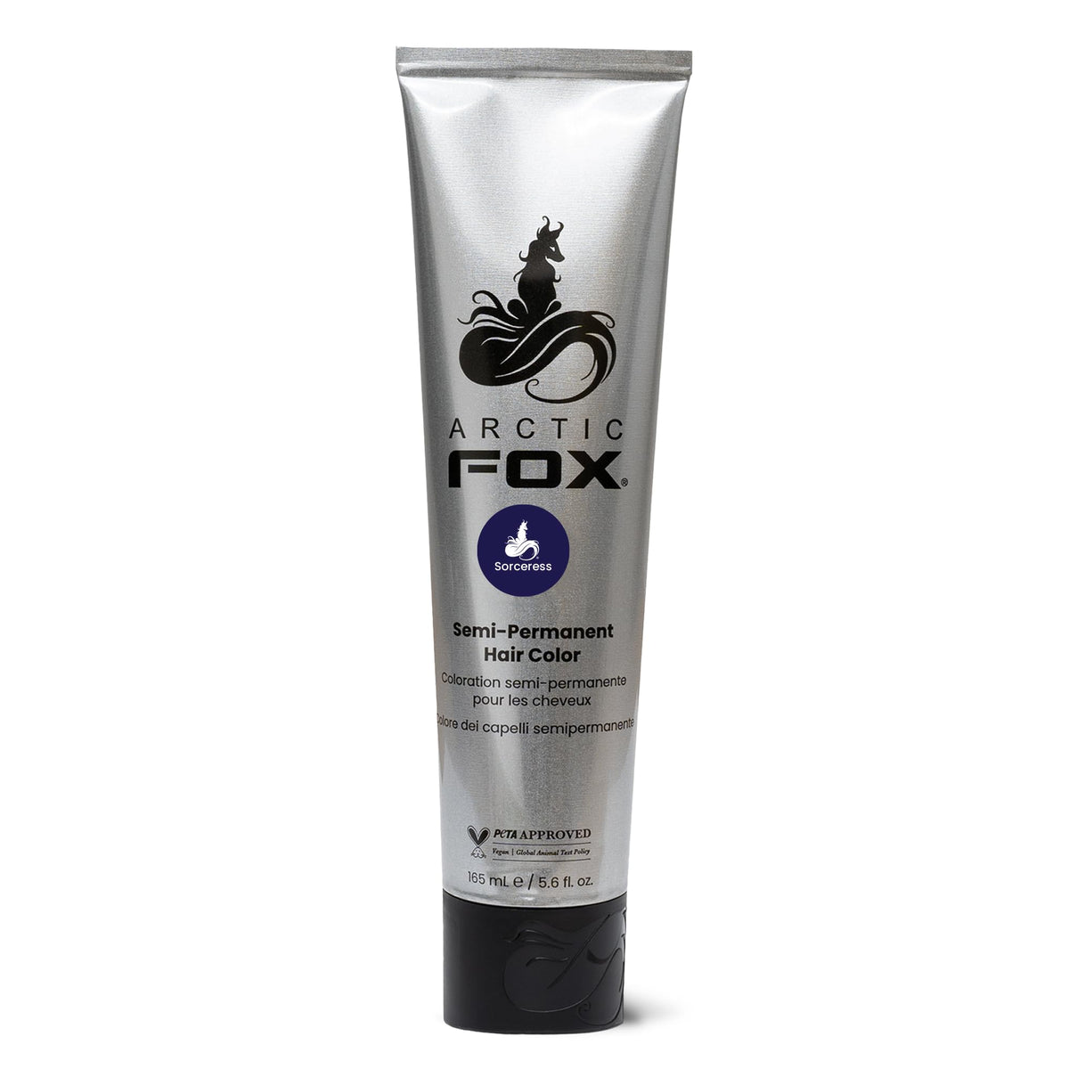 ARCTIC FOX stylist applying dye with brush for even coverage and professional finish