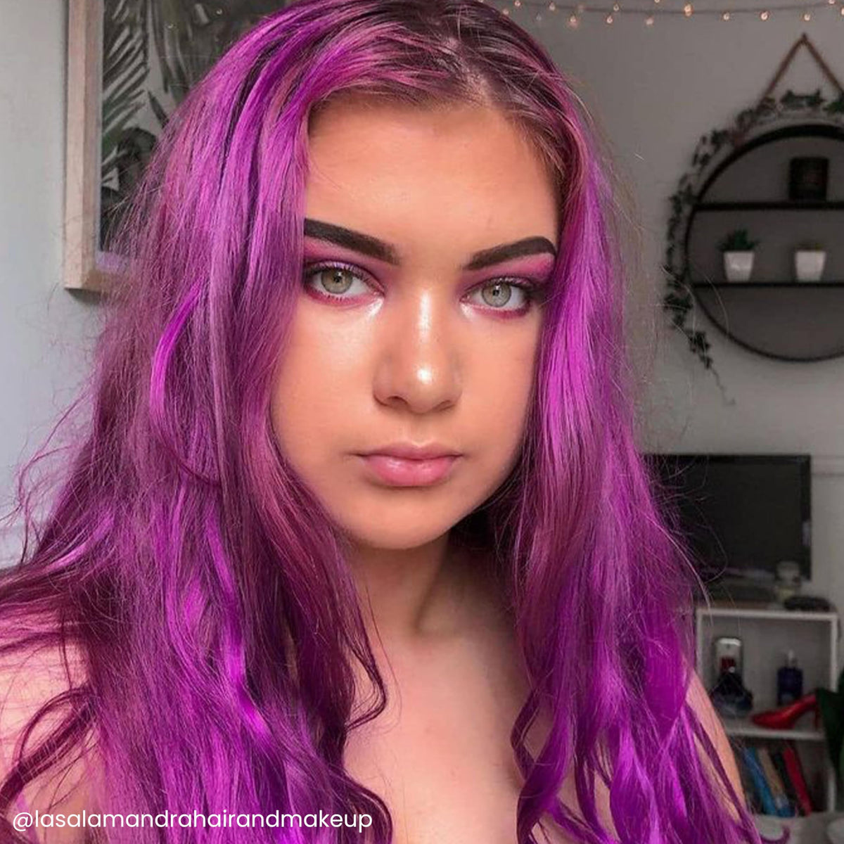 ARCTIC FOX swatch on light blonde hair highlighting vivid violet payoff and color impact