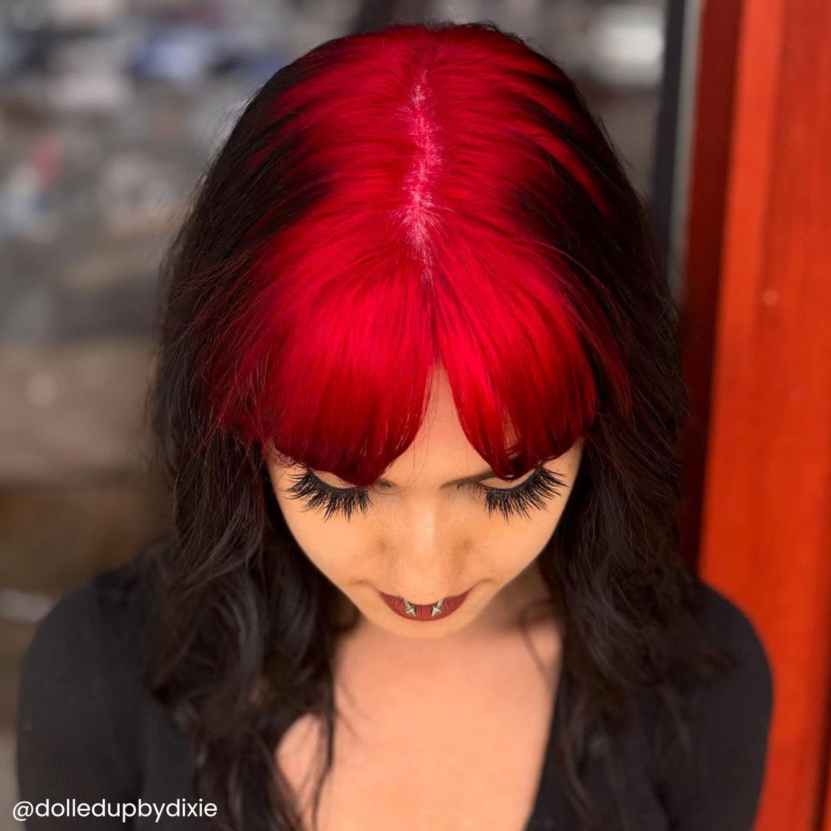 ARCTIC FOX Wrath being applied to a hair strand for vivid long-lasting color