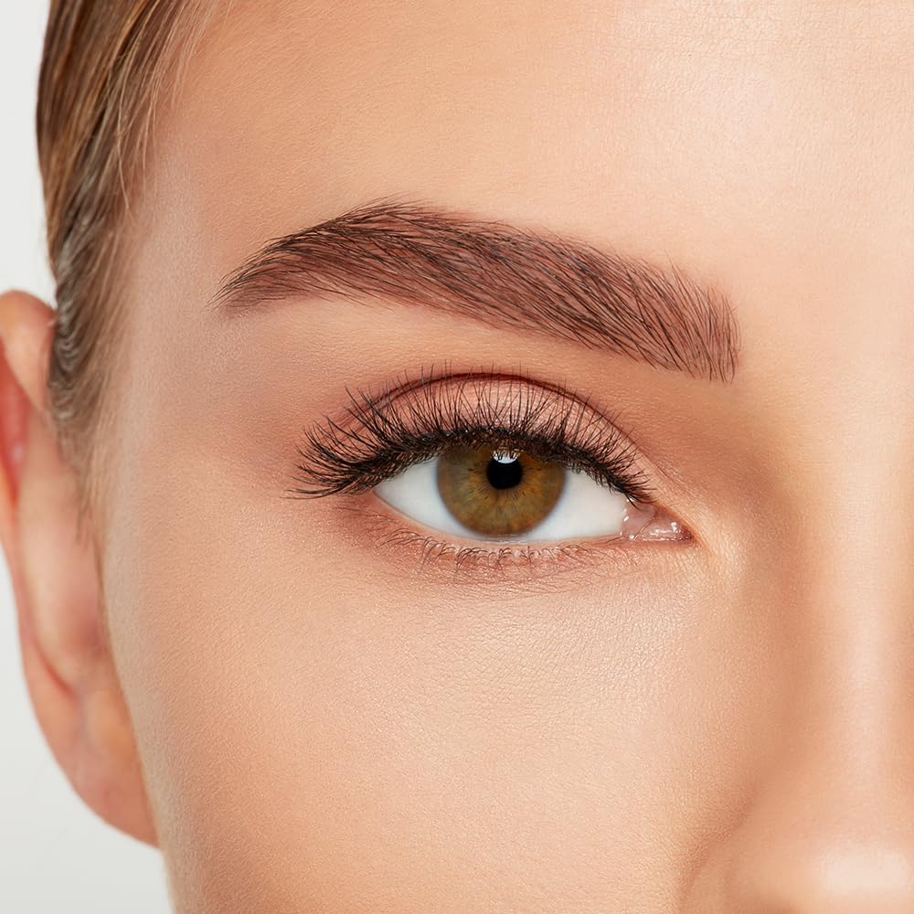 Ardell lash application with tweezers showing easy placement advantage