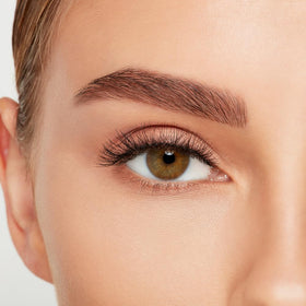 Ardell lash application with tweezers showing easy placement advantage
