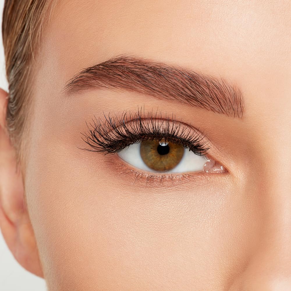 Ardell lashes beside ruler showing scale and trim-to-fit convenience