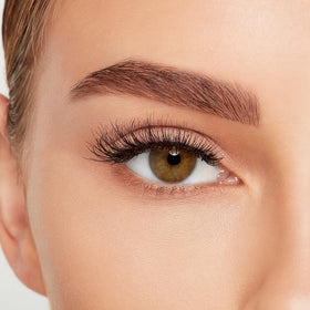 Ardell lashes beside ruler showing scale and trim-to-fit convenience