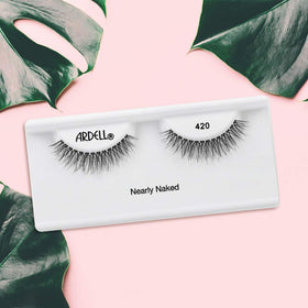Ardell lashes on hand illustrating scale and reusable convenience