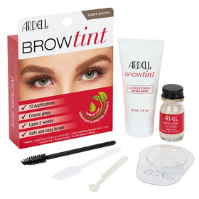 Ardell kit beside coin showing compact travel-friendly size