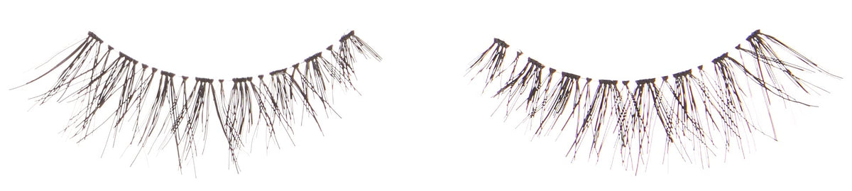 Ardell lash strip held in hand showing scale and lightweight flexibility