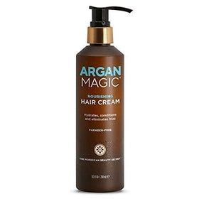 Argan Magic jar held in hand to show 8.5 oz size and portability