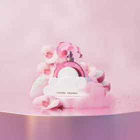 Ariana Grande Cloud Pink on vanity with flowers, lifestyle scene inspiring confidence and daytime wear