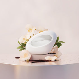 Ariana Grande MOD Vanilla on vanity with styling props, suggests wearable everyday luxury