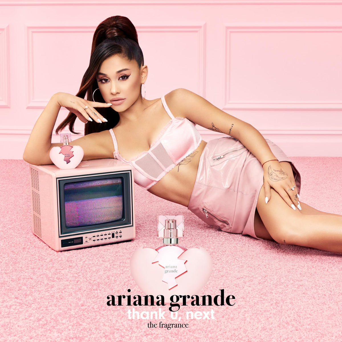 Ariana Grande Thank U, Next being sprayed on wrist, quick refreshing fragrance boost