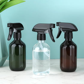 Arkeiliy bottle held in hand showing 300ml size for portable use and easy refills