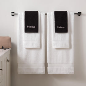 Arkwright LLC towels displayed on bathroom vanity showing organized, modern storage benefit