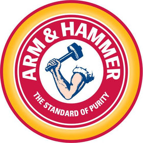 Arm & Hammer stick next to seashells evoking coconut geranium scent and freshness