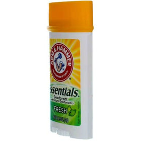 Arm & Hammer stick held in hand for scale showing 2.5-ounce travel-friendly size
