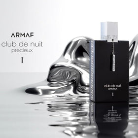 Armaf bottle beside ruler showing 1.85 oz scale for accurate size