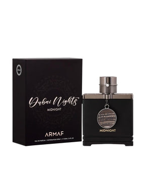 Armaf bottle mid-spray demonstrating fine atomization and long-lasting projection