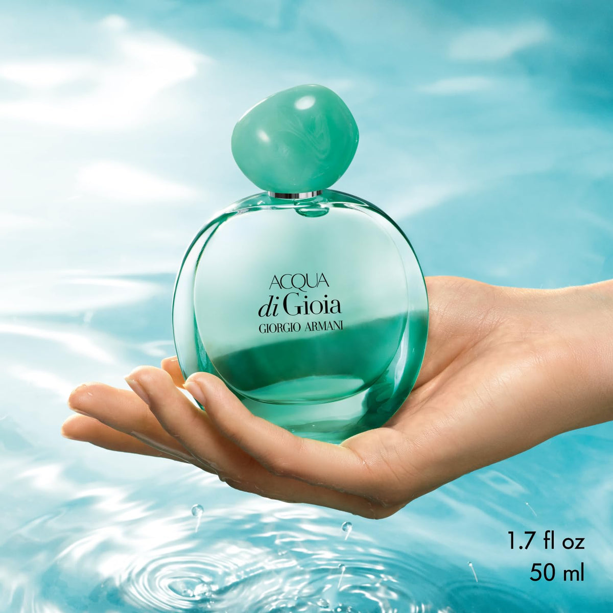 Armani Beauty mist spray in action demonstrating fine, even fragrance dispersion