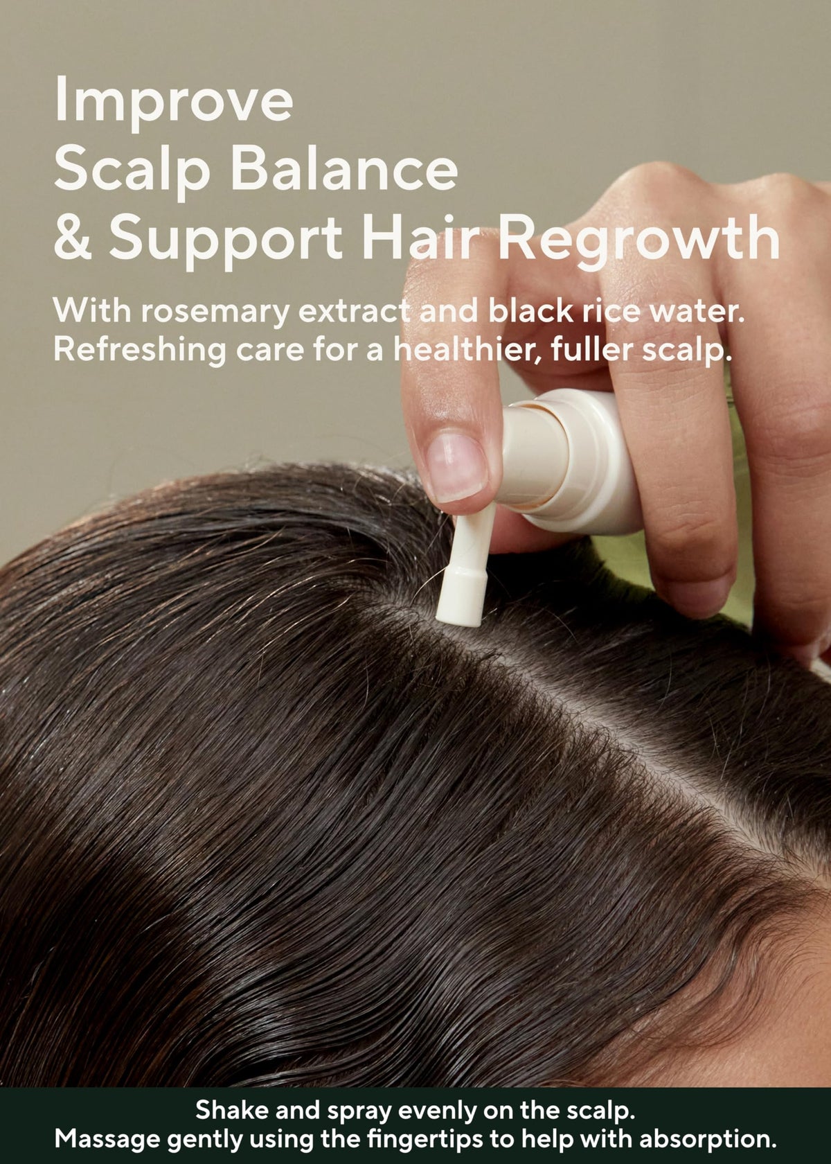 AROMATICA applying spray to scalp demonstrating easy targeted use