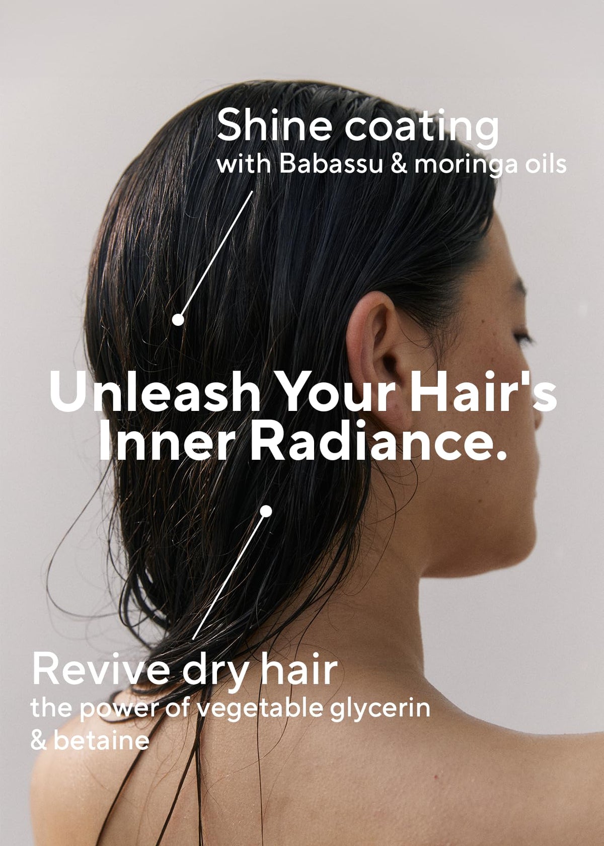 AROMATICA conditioner applied to hair mid-wash showing detangling benefit and smoother strands