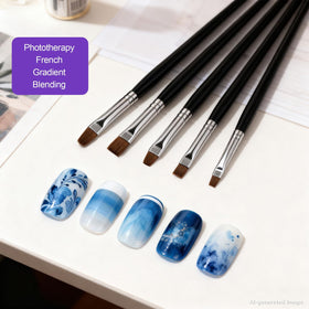 Artdone tools in use painting a press-on nail demonstrating accurate small-detail application