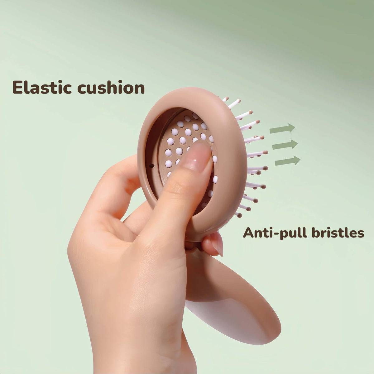 Arthaxi close-up of air-cushion bristles and hinge highlighting gentle detangling and durability