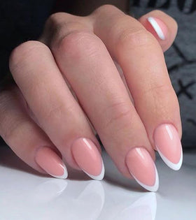 Artquee close-up of glossy white French tip highlighting durable shine