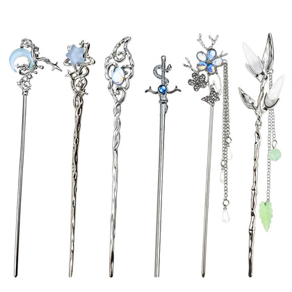 Arvintas front view of six silver hair sticks showing full set and variety benefits