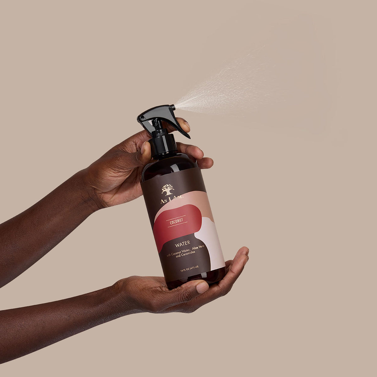As I Am spray mist being applied for quick lightweight hydration