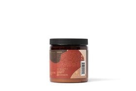As I Am applying crème to damp hair showing enhanced curl formation