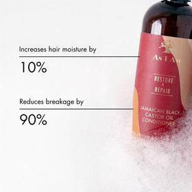 As I Am conditioner being applied during detangling to reduce breakage