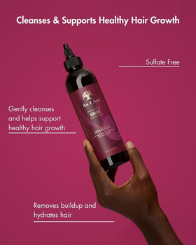 As I Am in-shower use rinsing hair to show buildup removal benefit