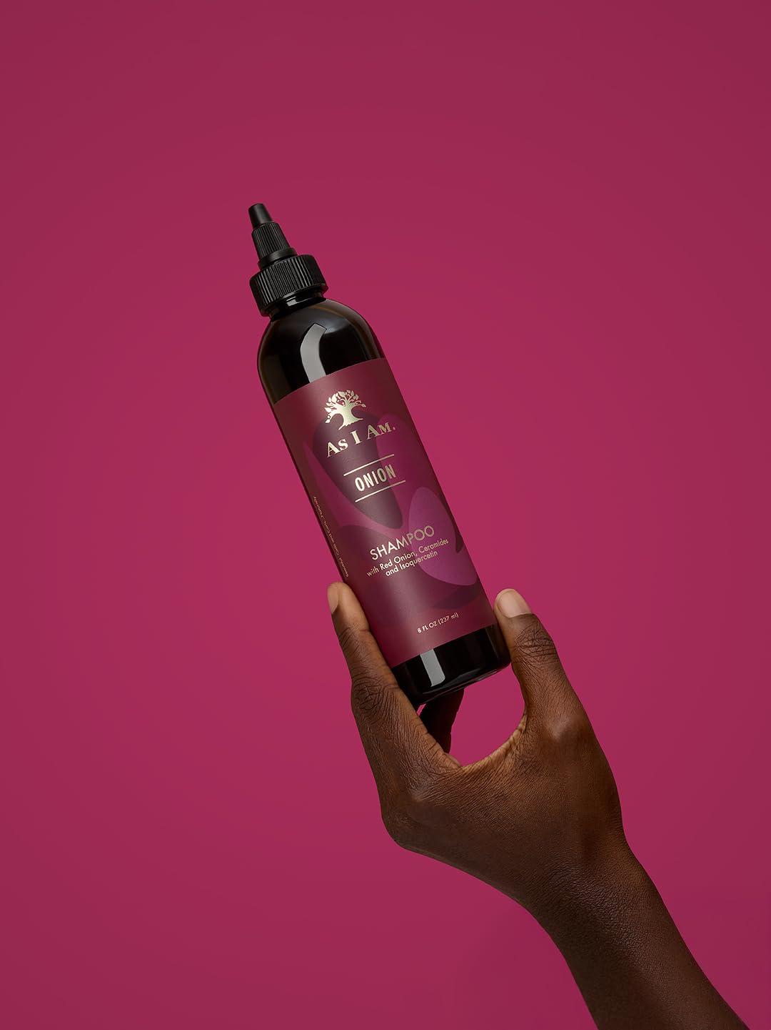 As I Am shampoo next to a ruler showing compact 8 oz travel-friendly size